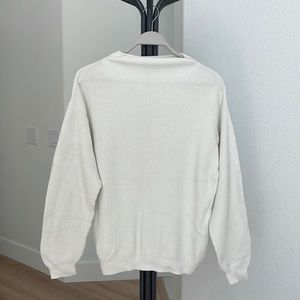 Won hundred white sweaters